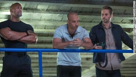 Dwayne Johnson, Vin Diesel and Paul Walker in "Furious 6"