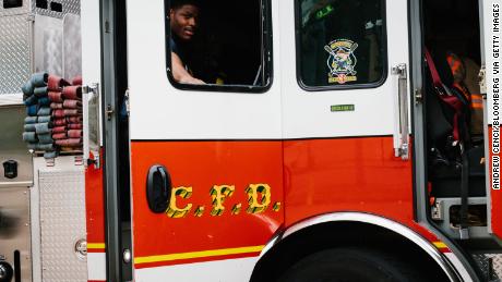Members of the Cincinnati Fire Department respond to a call at Greyhound station in Cincinnati, Ohio, on July 16, 2020.