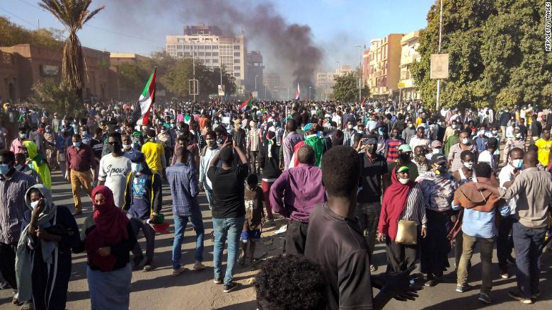 At least four anti-coup protesters shot dead in Sudan as security forces raid broadcasters