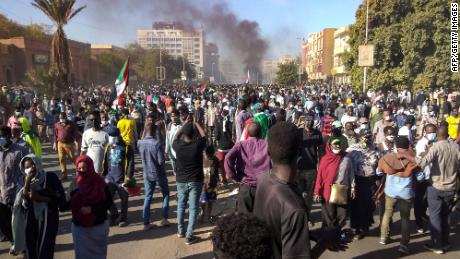 Sudanese protesters demonstrating against the military coup gather near the presidential palace in Khartoum on Thursday.