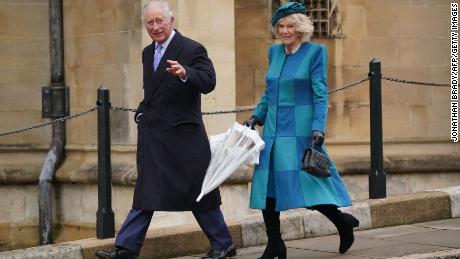 Charles and Camilla are seen making their way to the Christmas Day morning church service at St. George&#39;s Chapel.