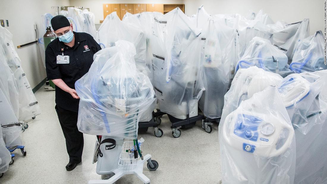 A health care worker prepares respirators for Covid-19 patients at the IU Health Ball Memorial Hospital in Muncie, Indiana, on December 28. 