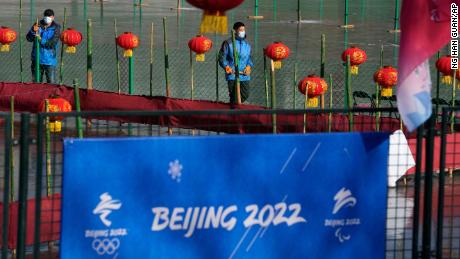 Workers prepare the ice surface for winter activities on New Year&#39;s Eve in Beijing, China, on December 31, 2021.
