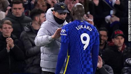 Chelsea manager Thomas Tuchel (left) speaks to Romelu Lukaku during the Premier League match against Brighton at Stamford Bridge on December 29.