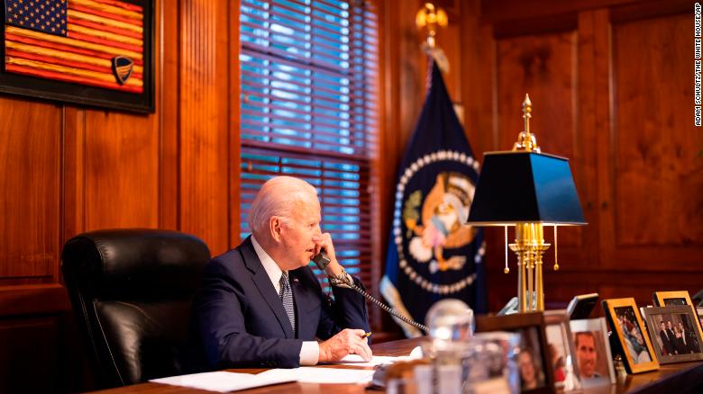 In this image provided by The White House, President Joe Biden speaks with Russian President Vladimir Putin on the phone from his private residence in Wilmington, Del., Thursday, Dec. 30, 2021. 