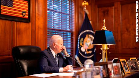 In this image provided by the White House, President Joe Biden speaks with Russian President Vladimir Putin by phone from his private residence in Wilmington, Delaware on Thursday, December 30, 2021. 