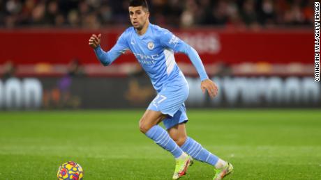 Cancelo is pictured during the Premier League match between Brentford  and  Manchester City at the Brentford Community Stadium on December 29, 2021.