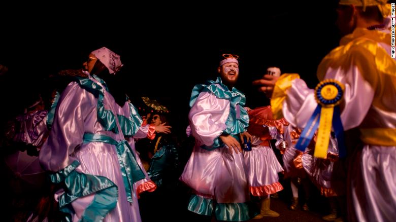 Fiasco group Mummers dance on 2nd Street during night partying on January 1, 2019 in Philadelphia, during the Mummers Parade.