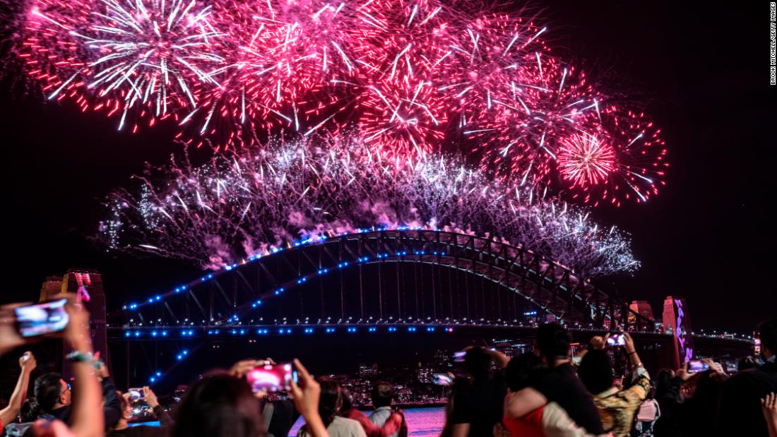 Fireworks light up the sky over Sydney Harbour as the clock strikes midnight on January 1, 2022 in Sydney, Australia. 