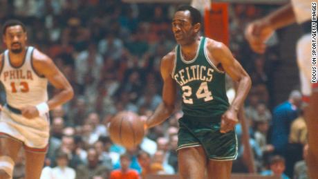 Sam Jones #24 of the Boston Celtics dribbles the ball up court against the Philadelphia 76ers during an NBA basketball game circa 1965 at Convention Hall in Philadelphia, Pennsylvania.