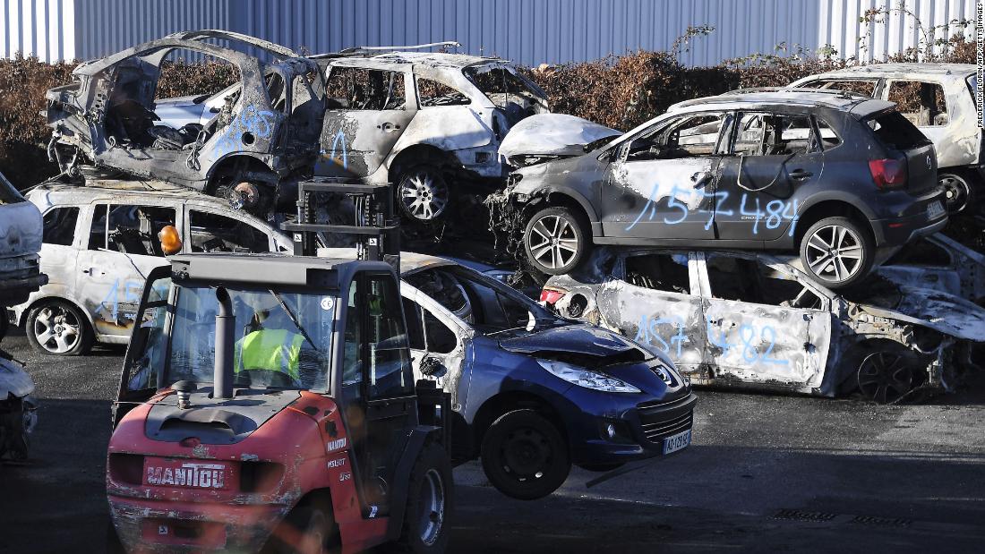 874 cars were torched in France on New Year's Eve -- fewer than in previous years