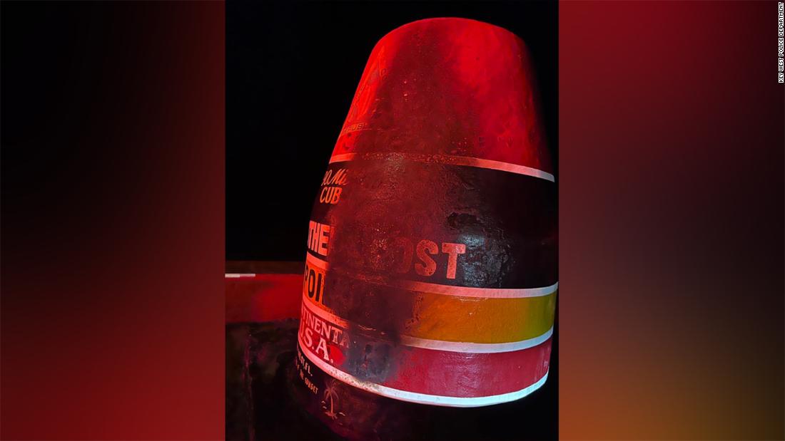 Key West’s Southernmost Point buoy damaged after men burn a Christmas tree in front of it, police say