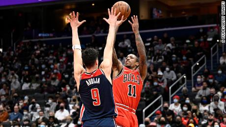 DeMar DeRozan #11 of the Chicago Bulls shoots the ball in the second half against Deni Avdija #9 of the Washington Wizards at Capital One Arena on January 01, 2022 in Washington, DC. 