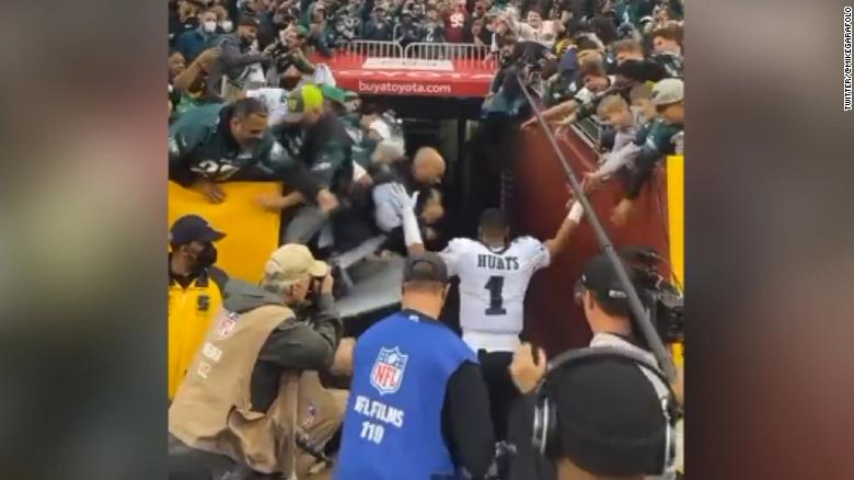 See moment fans fall from railing at Eagles game