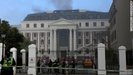 Firefighters battle the fire at South Africa's Parliament on Sunday.
