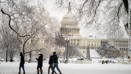 Washington, DC, sees record-setting snow as hurricane system moves east