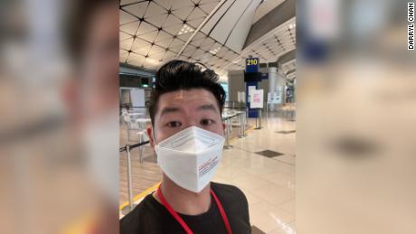 Traveler Darryl Chan waits for his coronavirus test results at Hong Kong airport on December 19, 2021.