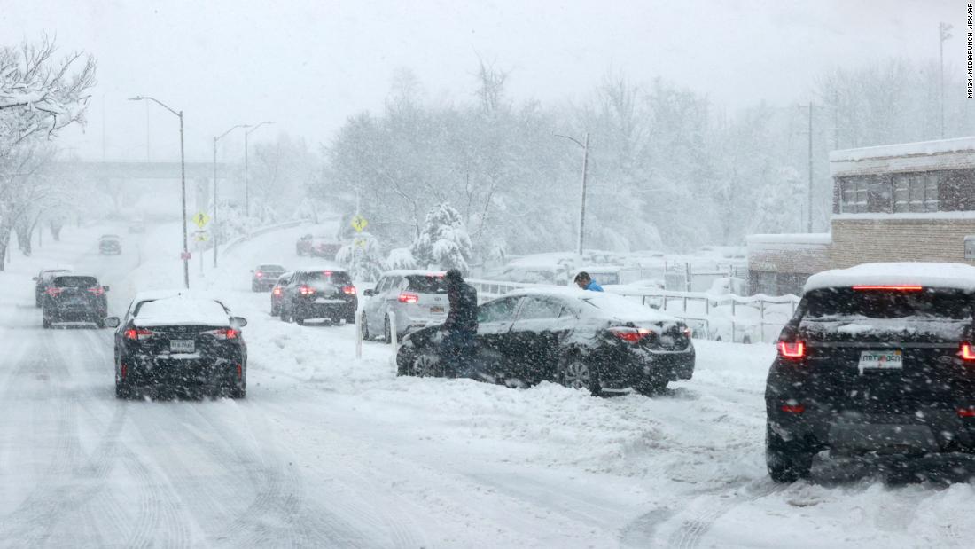 Motorists trapped overnight on East Coast interstate as winter storm causes icy, snowy havoc