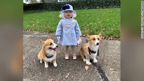 Jalayne Sutherland, accompanied by corgis Rascal and Jack, donned a royal outfit for Halloween.