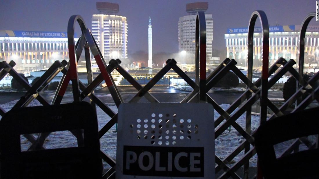 A police barricade is set up near the mayor&#39;s office in Almaty.