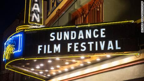 FILE - The marquee of the Egyptian Theatre appears during the Sundance Film Festival in Park City, Utah on Jan. 28, 2020.  The Sundance Film Festival is cancelling its in-person festival and reverting to an entirely virtual edition due to the current coronavirus surge. Festival organizers announced Wednesday, Jan 5, 2022, that the festival will start as scheduled on Jan. 20, but will shift online. Last year&#39;s Sundance was also held virtually because of the pandemic.  (Photo by Arthur Mola/Invision/AP, File)