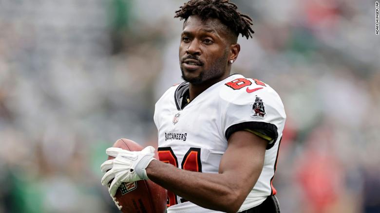 Antonio Brown says Buccaneers fired him for having a painful ankle injury before he left mid-game