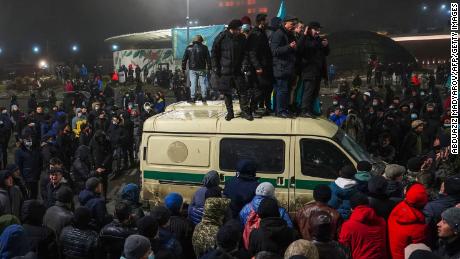 Dozens of protesters reported killed in Kazakhstan as Russia-led military alliance heads to the country 