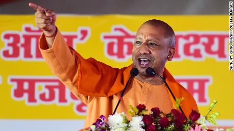 The chief minister of India's Uttar Pradesh state Yogi Adityanath addresses a public rally in Allahabad on December 26, 2021. 