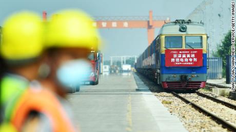 A train carrying 50 containers departs from China&#39;s Shijiazhuang International Land Port to Malaszewicze port in Poland on September 9, 2021.