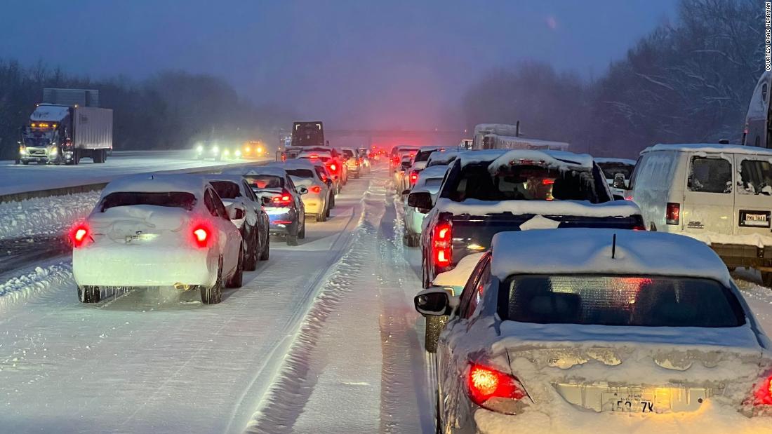 Winter weather in Kentucky halts roadways as authorities clear a pile-up with over 20 vehicles