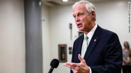 Sen. Ron Johnson answers questions from reporters in February 2021 in Washington, DC. 
