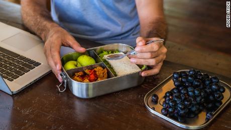 If you struggle with mindless snacking, taking a daily break for a proper lunch and keeping filling, fiber-rich fruit on hand are two ways to help avoid going overboard.