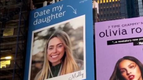 Beth Davis, with the help of the Wingman dating app, created this Times Square billboard for her daughter Molly.