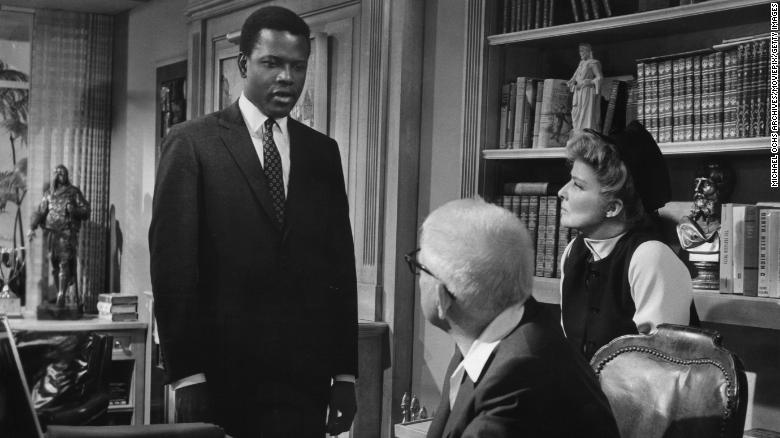 Sidney Poitier with Spencer Tracy and Katharine Hepburn in a scene from the 1967 film, "Guess Who's Coming To Dinner."