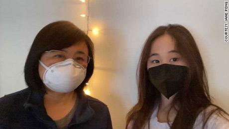 Jane Peng is taking precautions, as her daughter, right, tested positive for Covid-19 on Tuesday. 
