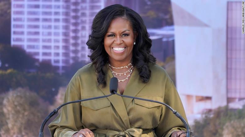 Former first lady Michelle Obama smiles as she speaks during a groundbreaking ceremony for the Obama Presidential Center Tuesday, Sept. 28, 2021, in Chicago.
