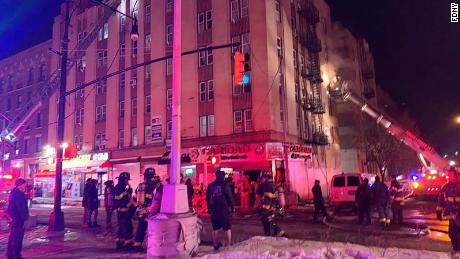 A four-alarm fire broke out at an apartment building in the Bronx early Saturday morning when the lithium-ion battery of an electric bike or scooter combusted on its own, according to the FDNY.