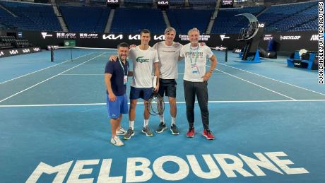 Novak Djokovic posted a photo of himself with his team on the Melbourne pitch after being released from detention. 