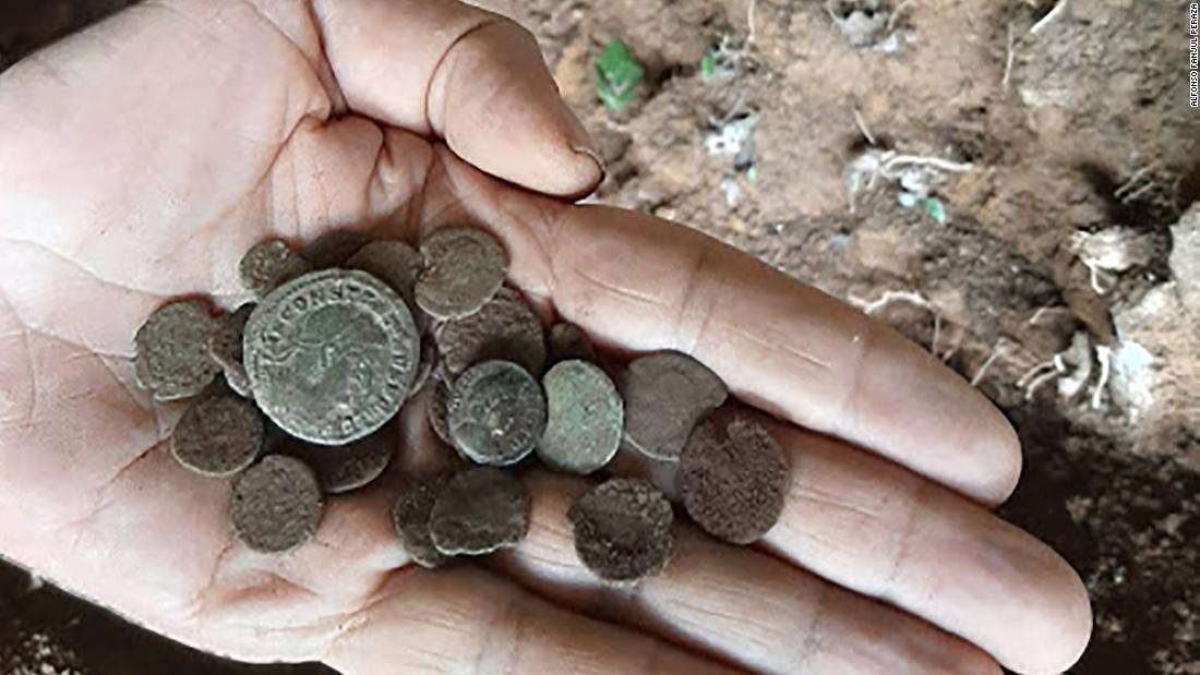 Badger leads archaeologists to hoard of Roman coins in Spain