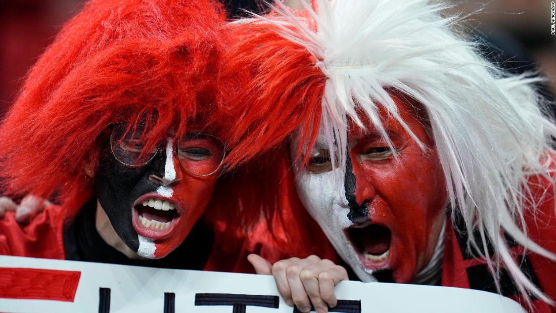 Georgia fans cheer before the game.