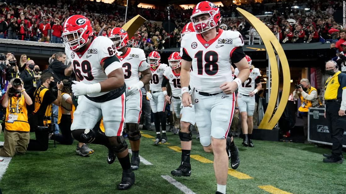 Georgia players take the field before the game.