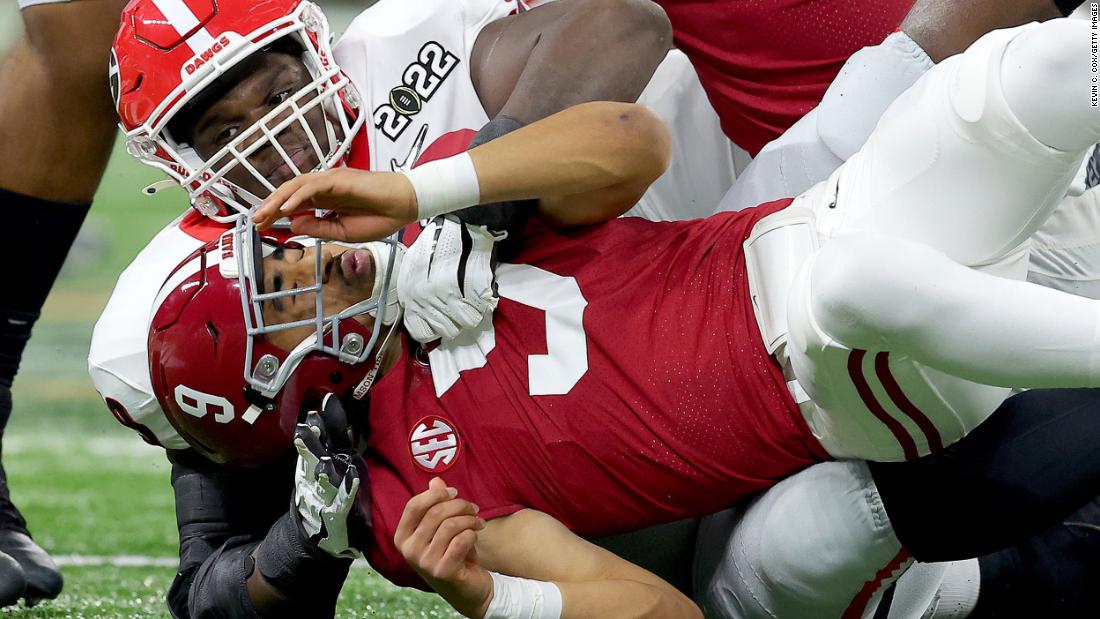 Georgia&#39;s Jordan Davis sacks Young on the game&#39;s opening drive. It was first ruled a fumble that Georgia returned for a touchdown. But replay reversed the call, and it was determined to be an incomplete pass instead.