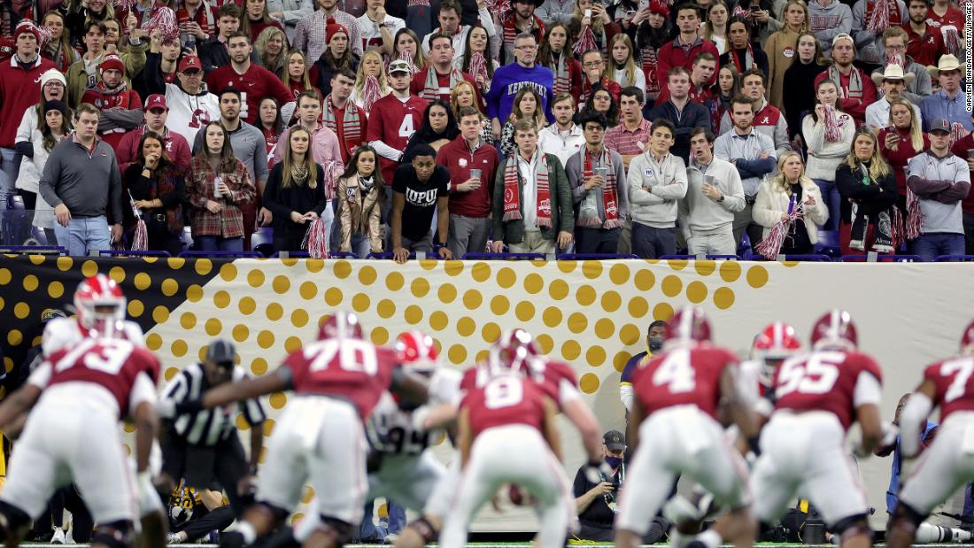 Fans watch the action in the first half.