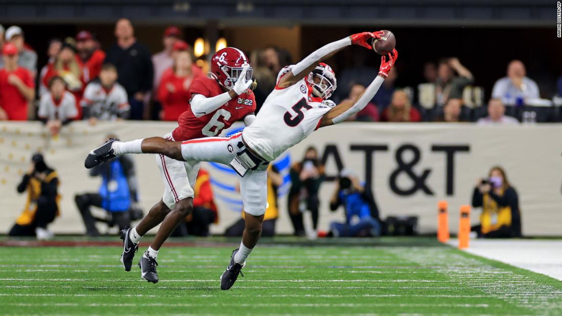 Mitchell tries to pull in a catch.