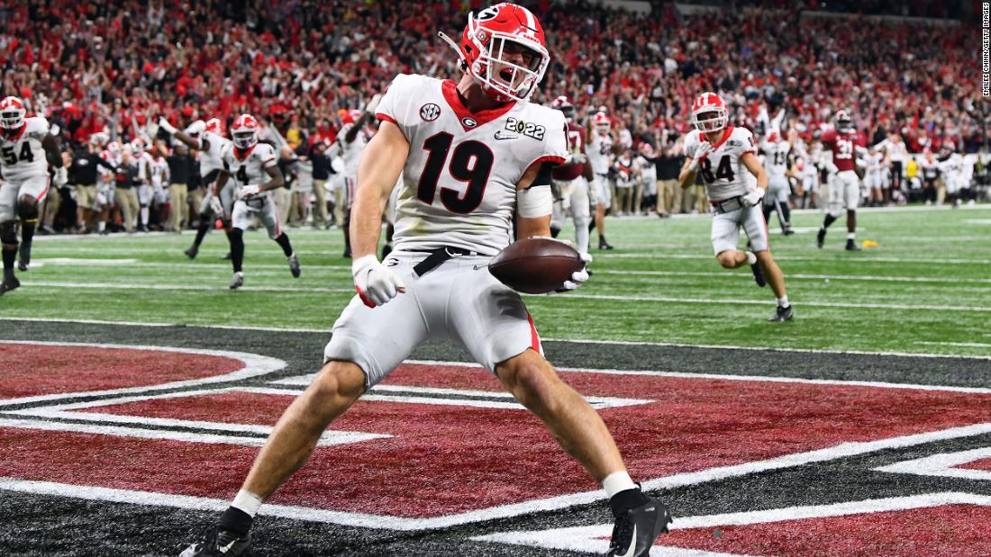 Georgia tight end Brock Bowers celebrates after scoring a touchdown to extend Georgia&#39;s lead in the fourth quarter. After the extra point, Georgia led 26-18.