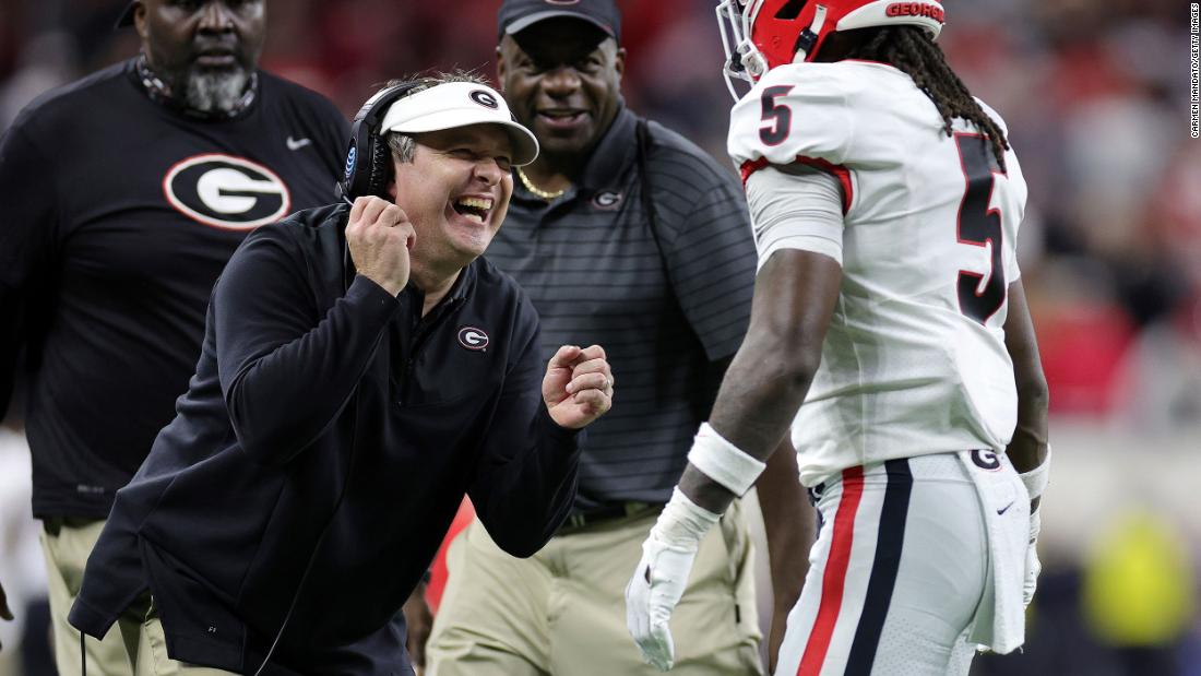 Smart celebrates with Ringo after his touchdown.