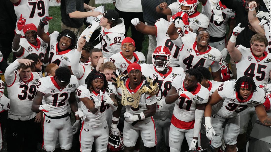 Georgia players celebrate on the sideline late in the game.