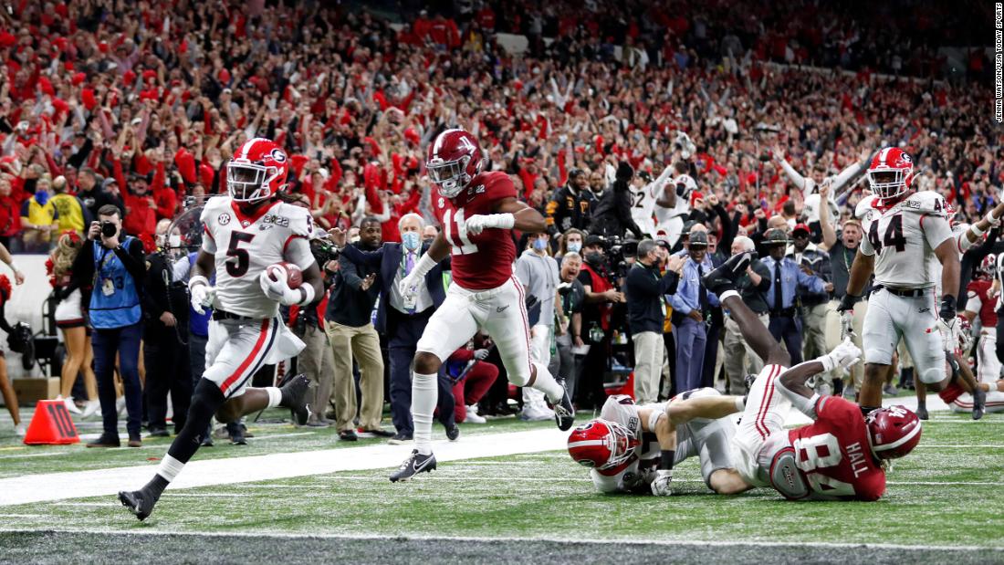 Ringo runs into the end zone after his pick-six.