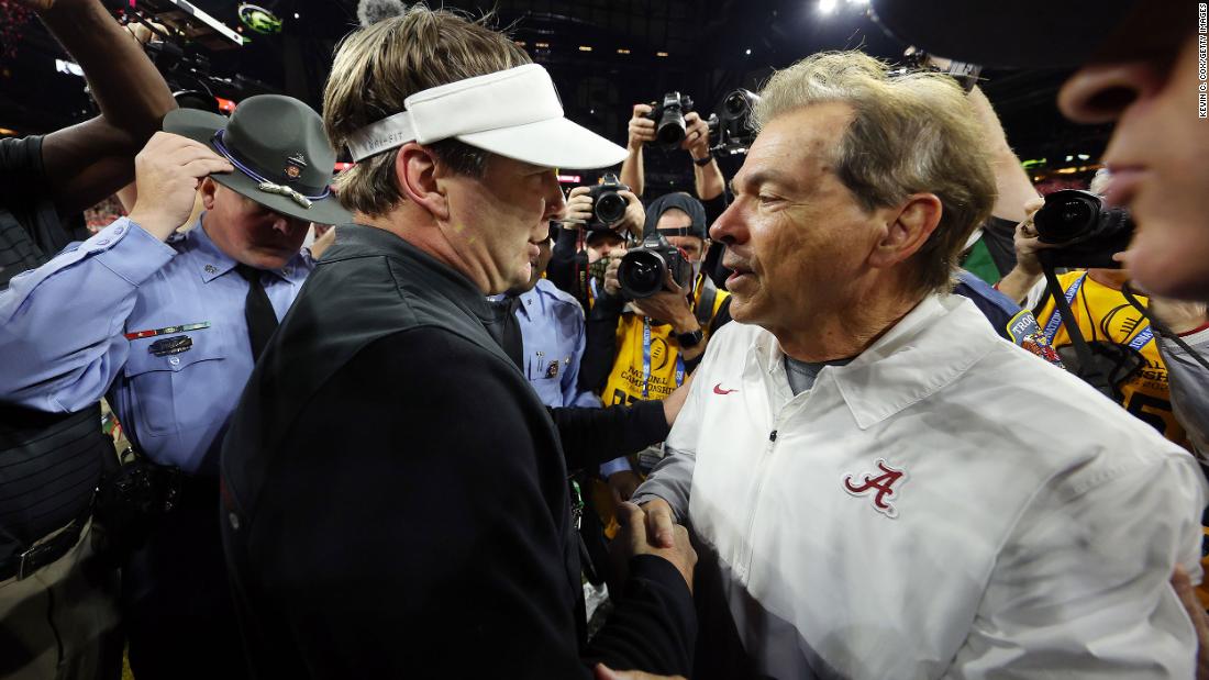 Smart shakes hands with Alabama head coach Nick Saban after the final whistle. Smart is a former Saban assistant who was 0-4 against him as a head coach.