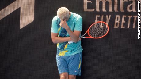 Tomic cuts a frustrated figure during his straight sets defeat.